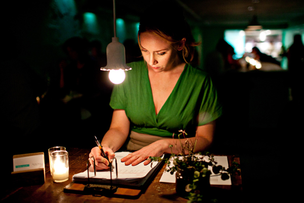 Hostess Writing Down Names