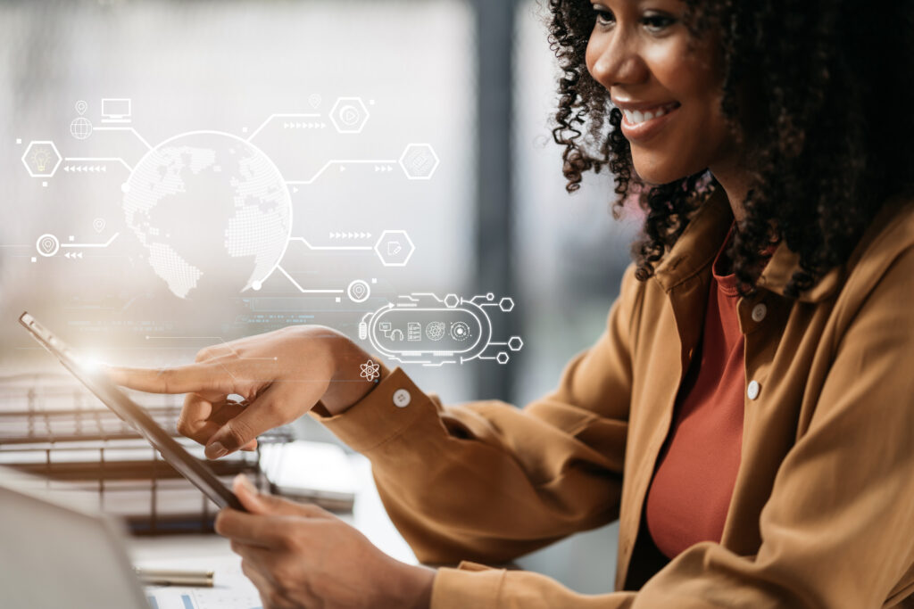 image of woman interacting with a tablet and graphic overlay of data