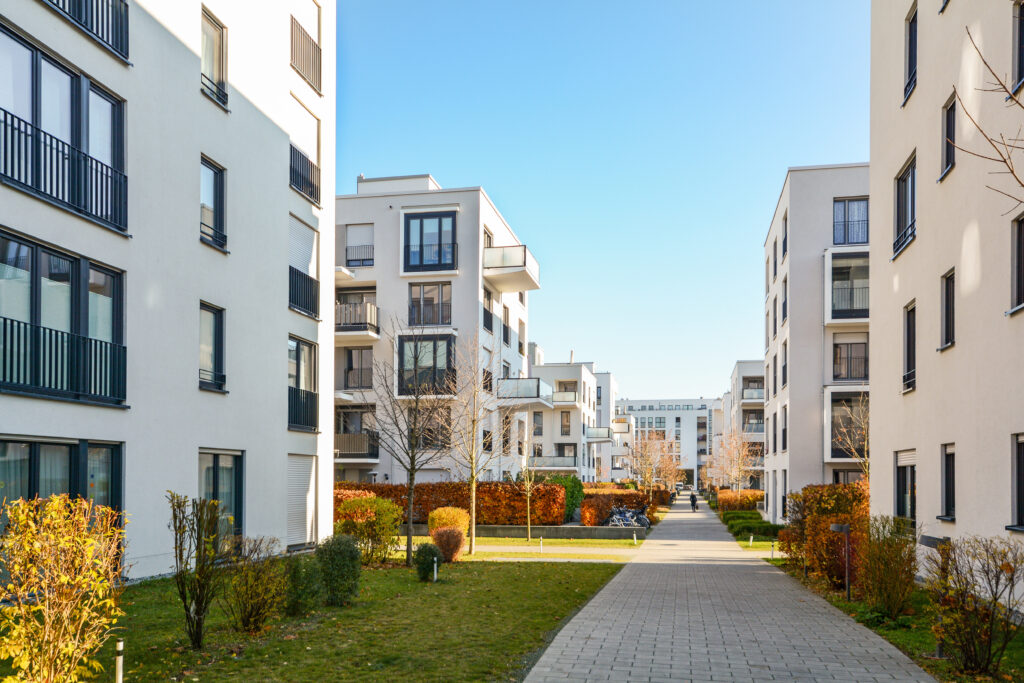 Row of white, modern apartment buildings